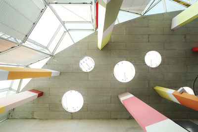 High angle view of multi colored umbrellas on tiled floor