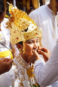 People with groom during wedding 