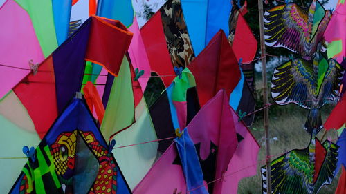 Low angle view of flags hanging on clothesline