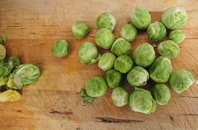 Brussels sprouts on wooden table. view from above