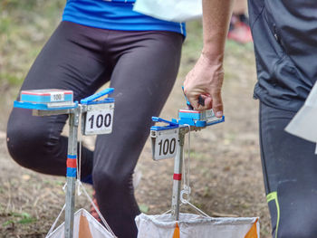 Outdoor orienteering check point activity. extreme training or race competition