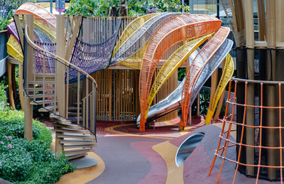 View of staircase in playground against building