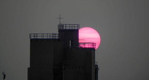 Low angle view of water tower against sky