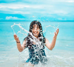 Girl enjoying in water