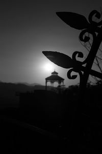 Close-up of silhouette against sky