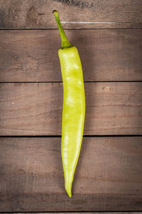High angle view of green chili pepper on table