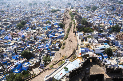 High angle view of street amidst buildings in city