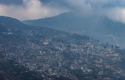 City urbanization view from hilltop with huge construction at day from flat angle