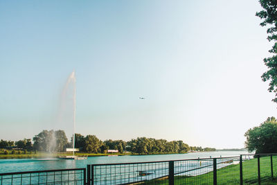 Scenic view of river against clear sky