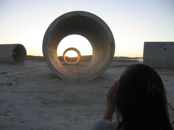 Woman looking at sunset