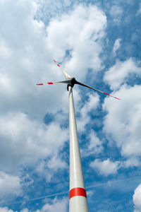 Low angle view of wind turbine against sky