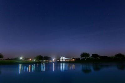 Scenic view of sea against sky at night