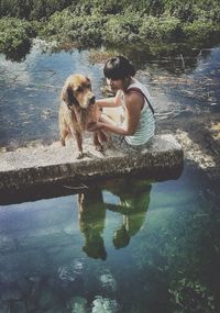 Reflection of woman in water