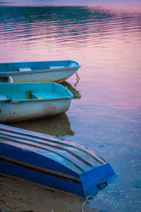 Boats moored in sea