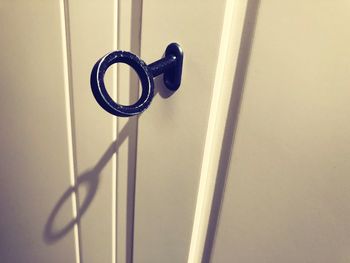 Close-up of door handle on wall