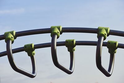 Low angle view of metal fence