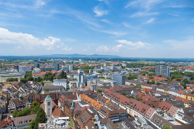 High angle shot of townscape against sky