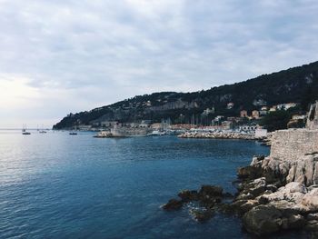 Scenic view of sea against cloudy sky