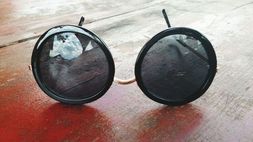 Close-up of sunglasses on table