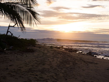 Scenic view of sea at sunset