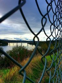 Fence seen through chainlink fence