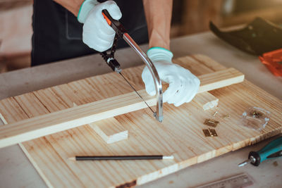 High angle view of person working on table