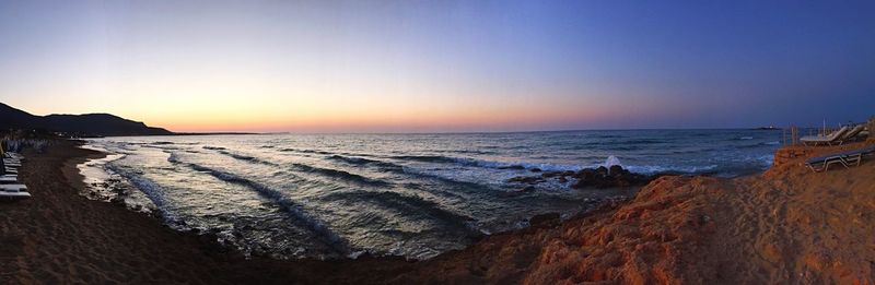 Scenic view of sea at sunset