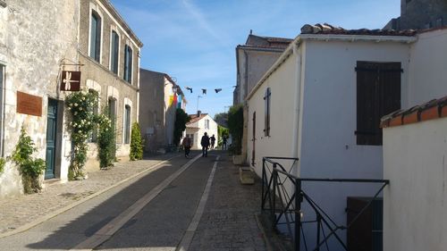 People walking on street in town