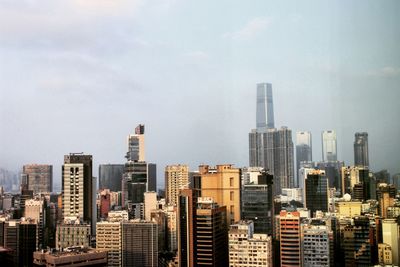 Modern buildings in city against sky