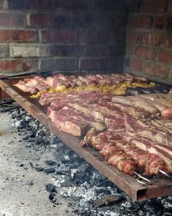 Close-up of meat on barbecue grill