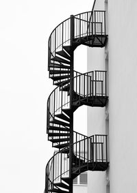 Low angle view of spiral staircase against building