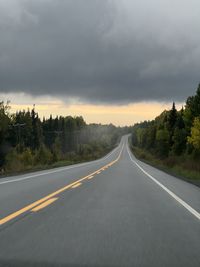 High angle view of light trails on road against sky