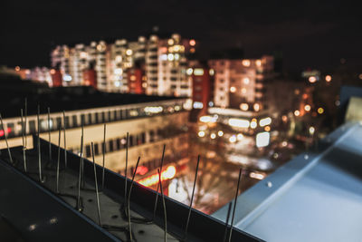 High angle view of illuminated buildings at night