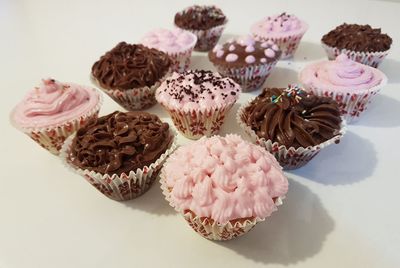 High angle view of cupcakes on white background