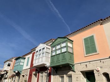 Low angle view of buildings in alacati city