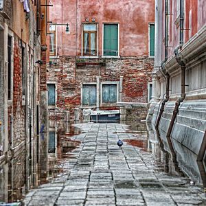 Narrow alley along buildings