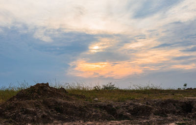 Scenic view of landscape against sky during sunset