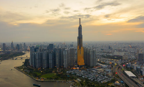 Aerial view of city buildings during sunset