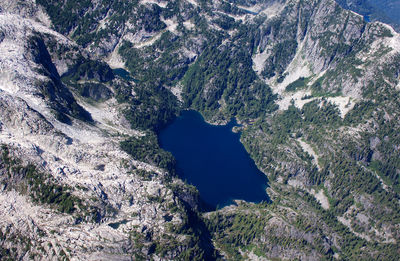 High angle view of rock formations in water