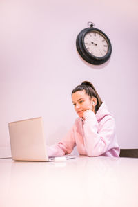 Young woman working on her laptop