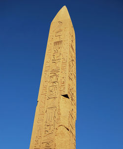 Ancient column, obelisk and pillar in temple of karnak. egypt