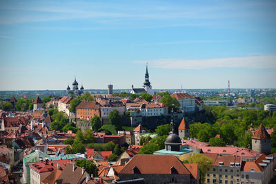 Town in city against sky