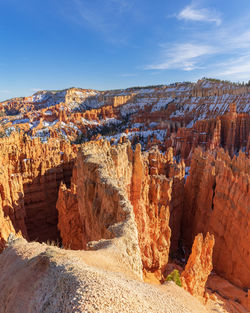 Panoramic view of rock formations against sky