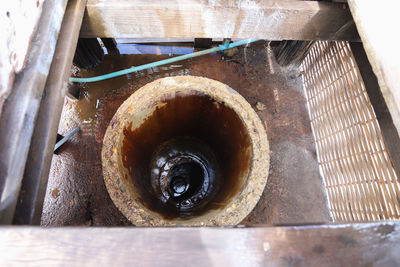 High angle view of rusty machine part