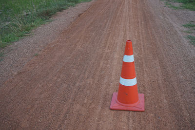 High angle view of arrow sign on road