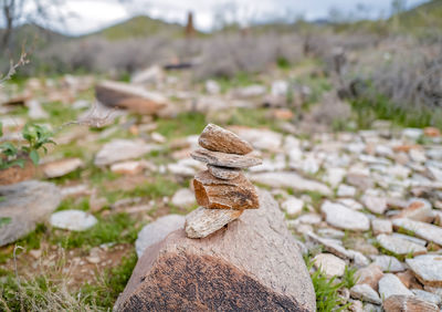 Close-up of stone stack on rock