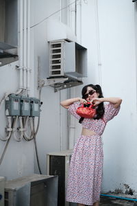 High angle view of woman standing in factory