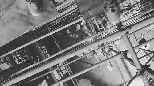 Low section of man standing on scaffolding at construction site