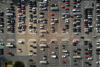 Parked cars on parking lot near shopping mall