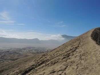 Scenic view of desert against sky